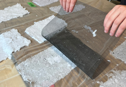 child making paper