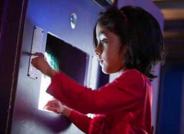 girl looking at screen
