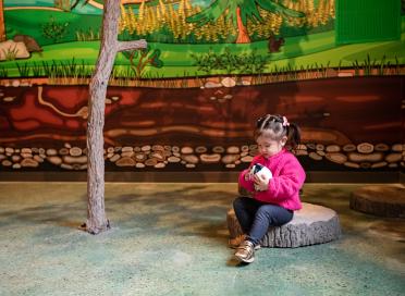 Child in Branching Out exhibit
